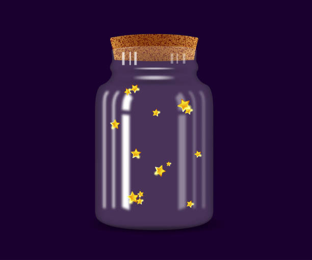 istock Golden  decorative stars in a glass transparent jar 2198875890