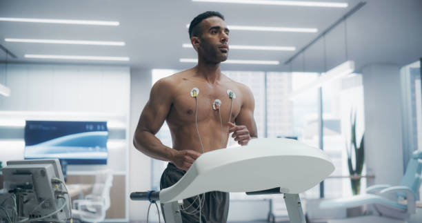 istock Athlete Performs Treadmill Exercise Test in a High-tech Medical Lab, Monitored by Sensors, Showcasing Advanced Fitness Evaluation and Health Monitoring 2198877267