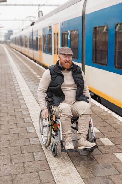 istock A wheelchair bound commuter on the platform during a day trip in the Netherlands 2198881655