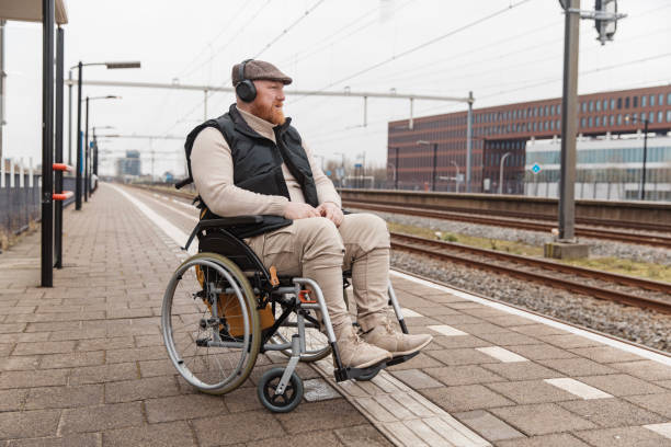 istock A wheelchair bound commuter on the platform during a day trip in the Netherlands 2198881656