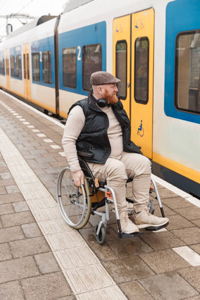 istock A wheelchair bound commuter on the platform during a day trip in the Netherlands 2198881666