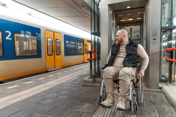 istock A wheelchair bound commuter on the platform during a day trip in the Netherlands 2198882722