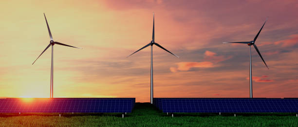 istock Three wind turbines are standing in a field with a sunset in the background 2198883979