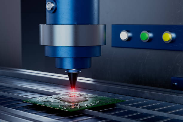 istock A blue machine with a laser cutting a piece of electronic equipment 2198885092