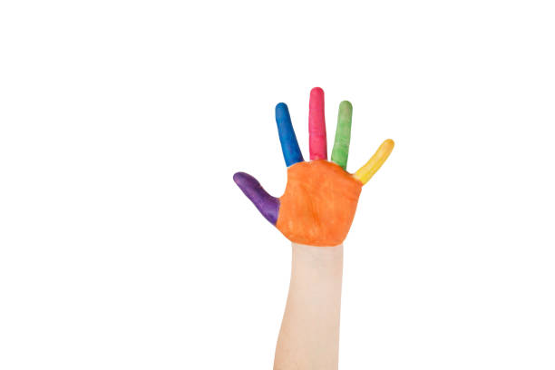 istock Child's hand painted with multicolored finger paints on white background 2198891151