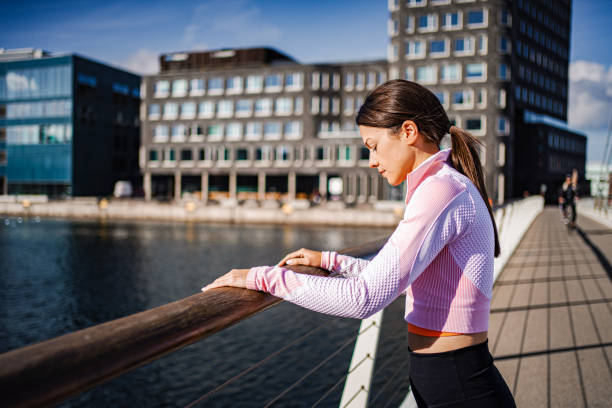istock Young Woman Resting on Bridge in Malmo 2198897422