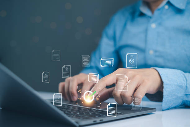 istock A person interacting with a digital document icon symbolizes the approval process for business project proposals and quality assurance. 2198905175