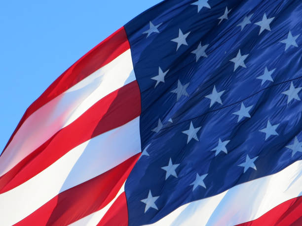 istock Red White and Blue American Flag and Sky 2198906485