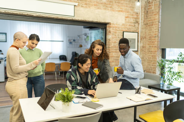 istock Multiethnic casual business people working together 2198910312