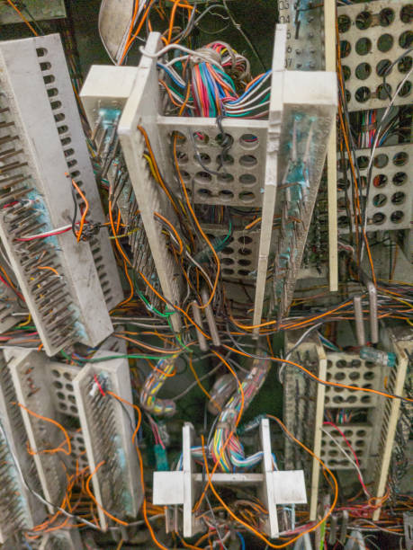 istock Telephone Box with destroyed cables, wires and connectors 2198910902