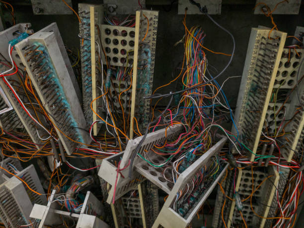 istock Telephone Box with destroyed cables, wires and connectors 2198910904