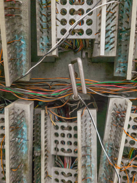 istock Telephone Box with destroyed cables, wires and connectors 2198910923