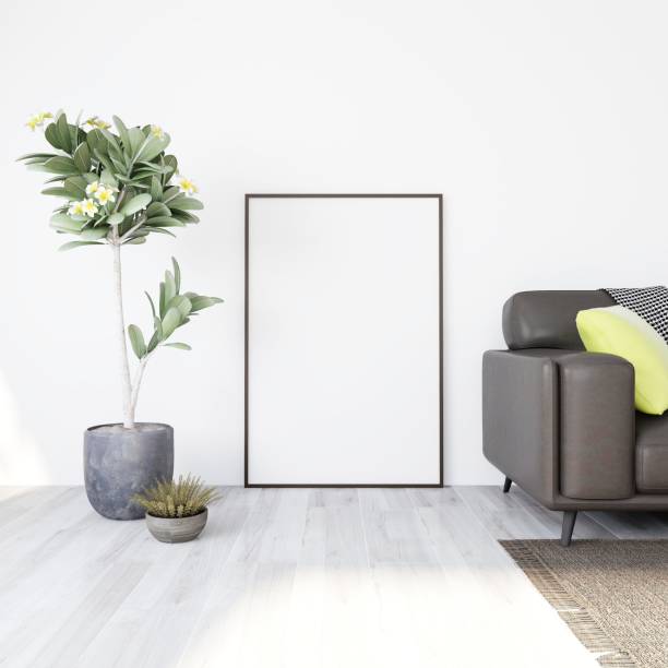 istock Modern living room with vertical frame mockup on the floor, interior decoration with ornamental plants 2198911265
