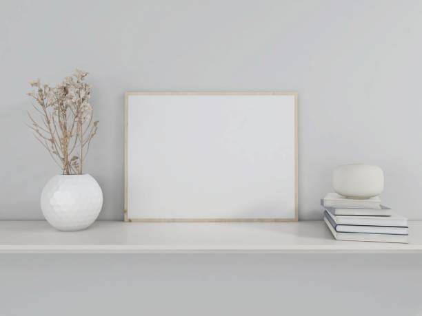 istock Blank horizontal frame mockup with books, plant and table decorations 2198911643