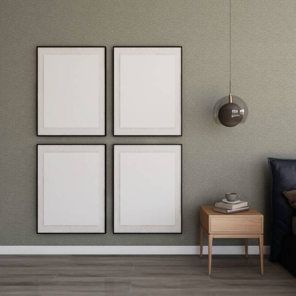 istock Bedroom with four vertical frame mockups, nightstand with books and lamp 2198912051