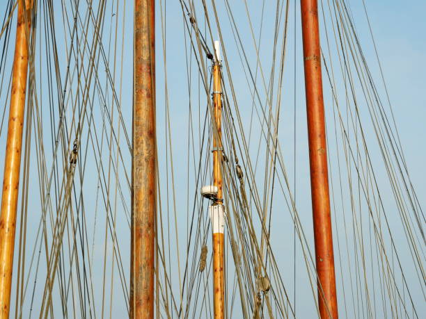 Yacht masts in harbor in storm