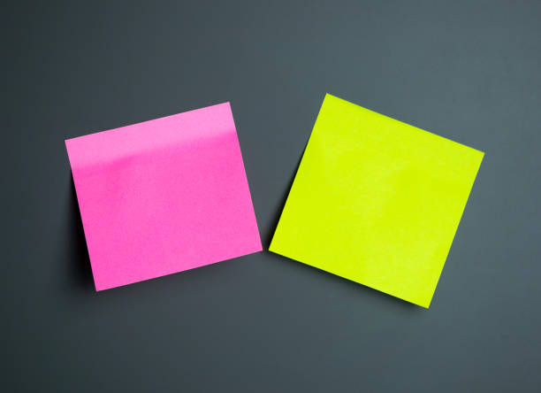 istock Bright sticky notes on a dark background showcase colors 2198916317