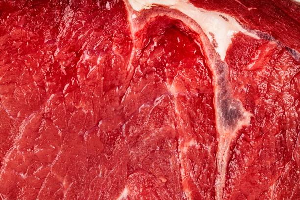istock Close-up of raw marbled beef texture. 2198916759