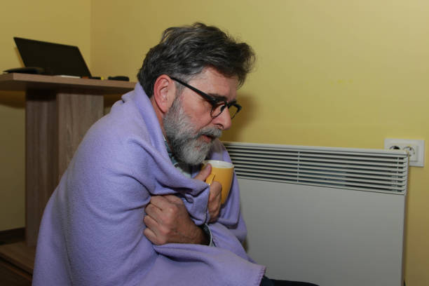 istock Senior man drink tea in cold winter days 2198917630