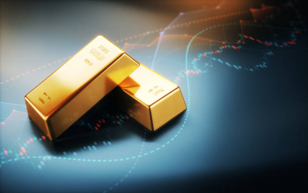 istock Realistic Gold Bars on Finance Graph Background, Depth Of Field 2198918542