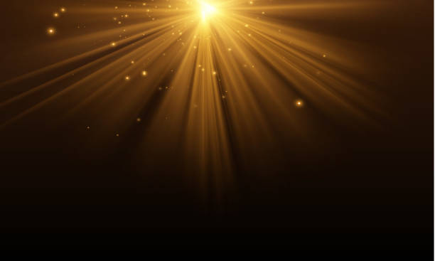 istock The light of gold dust, bokeh light effect background. Christmas glowing dust background, Yellow flickering glow with confetti bokeh light and particle motion. The dust sparks and golden stars shine. 2198919795
