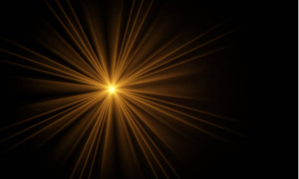 istock The light of gold dust, bokeh light effect background. Christmas glowing dust background, Yellow flickering glow with confetti bokeh light and particle motion. The dust sparks and golden stars shine. 2198919832