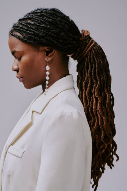 istock Woman Wearing White Blazer With Braided Ponytail 2198921406