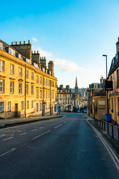 istock Empty street leading to bath abbey in the morning light 2198923394