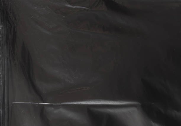 istock Closeup plastic vinyl torn wrap textures. Vector illustration show various crinkled, wrinkled, and transparent plastic wraps with different tear patterns. Ideal for design overlays and shadow effect. 2198926341