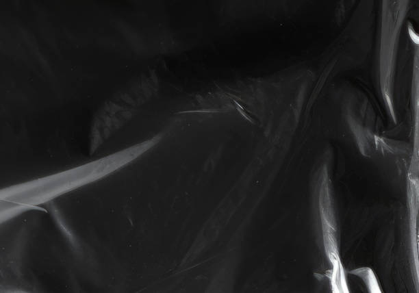 istock Closeup plastic vinyl torn wrap textures. Vector illustration show various crinkled, wrinkled, and transparent plastic wraps with different tear patterns. Ideal for design overlays and shadow effect. 2198926478