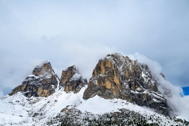 Beautiful winter alpine landscape covered in snow. Sassolungu and Sasso Piato from Gardena pass, Dolomiti.