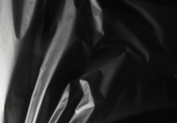 istock Closeup plastic vinyl torn wrap textures. Vector illustration show various crinkled, wrinkled, and transparent plastic wraps with different tear patterns. Ideal for design overlays and shadow effect. 2198927626