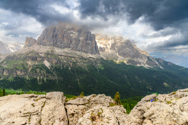 View on the Tofana di Rozes of the Tofana mountain group in the Dolomites during a springtime day in Veneto near Cortina d'Ampezzo, Italy.