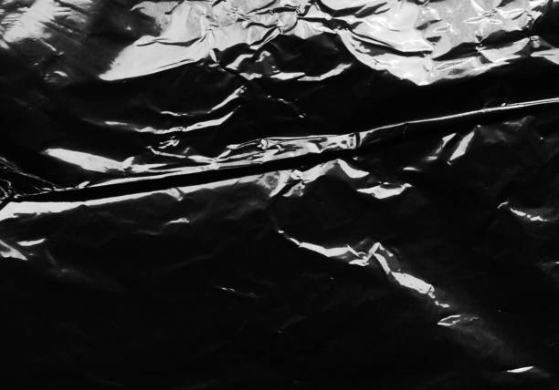 istock Closeup plastic vinyl torn wrap textures. Vector illustration show various crinkled, wrinkled, and transparent plastic wraps with different tear patterns. Ideal for design overlays and shadow effect. 2198928242