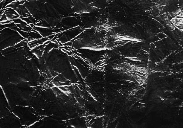 istock Closeup plastic vinyl torn wrap textures. Vector illustration show various crinkled, wrinkled, and transparent plastic wraps with different tear patterns. Ideal for design overlays and shadow effect. 2198928295