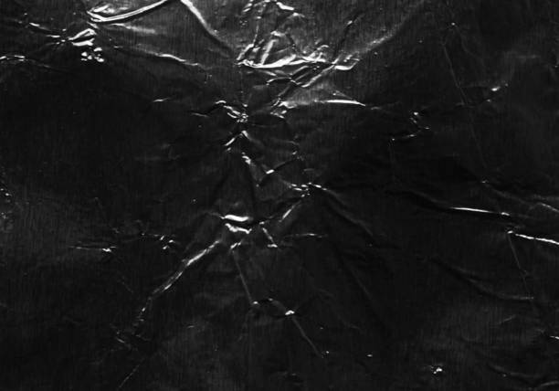 istock Closeup plastic vinyl torn wrap textures. Vector illustration show various crinkled, wrinkled, and transparent plastic wraps with different tear patterns. Ideal for design overlays and shadow effect. 2198928319
