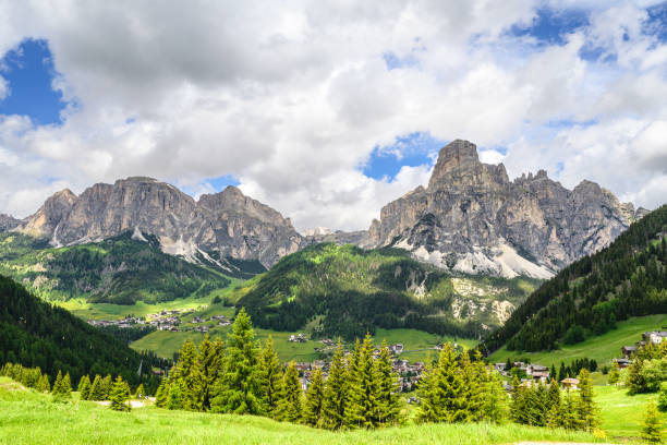 View on Coravara village  and the Puez mountain Group in Alta Badia, Dolomites during sunset