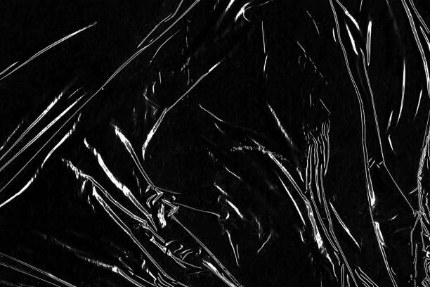 istock Closeup plastic vinyl torn wrap textures. Vector illustration show various crinkled, wrinkled, and transparent plastic wraps with different tear patterns. Ideal for design overlays and shadow effect. 2198928590