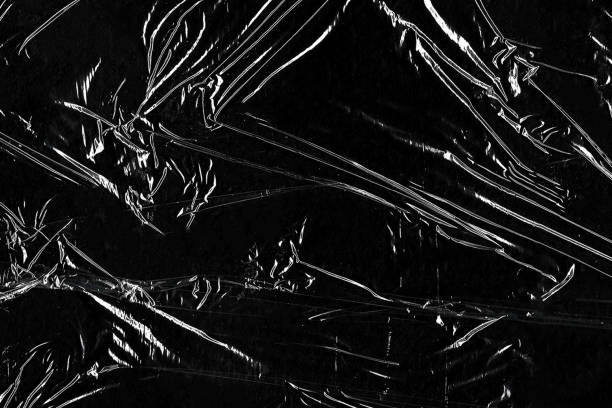 istock Closeup plastic vinyl torn wrap textures. Vector illustration show various crinkled, wrinkled, and transparent plastic wraps with different tear patterns. Ideal for design overlays and shadow effect. 2198928592