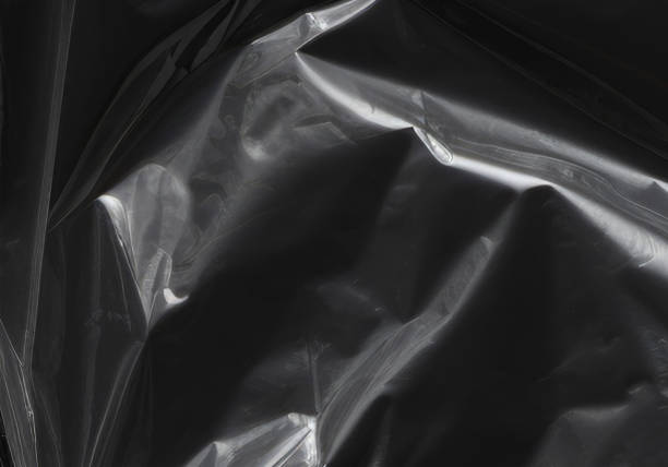 istock Closeup plastic vinyl torn wrap textures. Vector illustration show various crinkled, wrinkled, and transparent plastic wraps with different tear patterns. Black gray design overlays and shadow effect. 2198928700