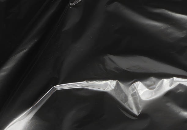 istock Closeup plastic vinyl torn wrap textures. Vector illustration show various crinkled, wrinkled, and transparent plastic wraps with different tear patterns. Black gray design overlays and shadow effect. 2198928744