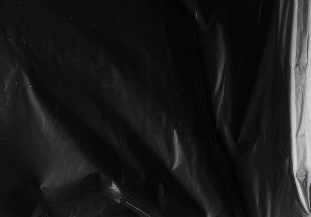 istock Closeup plastic vinyl torn wrap textures. Vector illustration show various crinkled, wrinkled, and transparent plastic wraps with different tear patterns. Black gray design overlays and shadow effect. 2198929612
