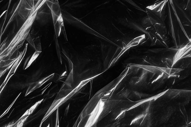 istock Closeup plastic vinyl torn wrap textures. Vector illustration show various crinkled, wrinkled, and transparent plastic wraps with different tear patterns. Black gray design overlays and shadow effect. 2198930059
