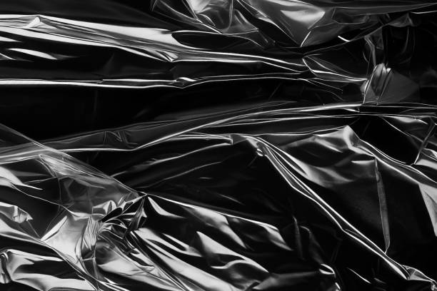 istock Closeup plastic vinyl torn wrap textures. Vector illustration show various crinkled, wrinkled, and transparent plastic wraps with different tear patterns. Black gray design overlays and shadow effect. 2198930071