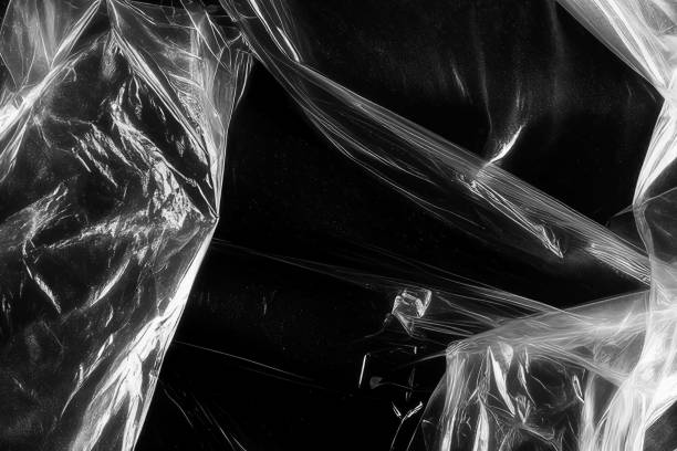 istock Closeup plastic vinyl torn wrap textures. Vector illustration show various crinkled, wrinkled, and transparent plastic wraps with different tear patterns. Black gray design overlays and shadow effect. 2198930072