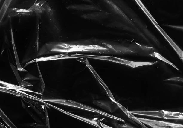 istock Closeup plastic vinyl torn wrap textures. Vector illustration show various crinkled, wrinkled, and transparent plastic wraps with different tear patterns. Black gray design overlays and shadow effect. 2198930246