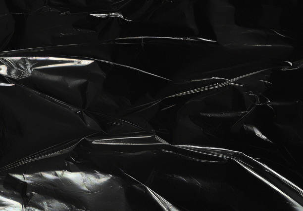 istock Closeup plastic vinyl torn wrap textures. Vector illustration show various crinkled, wrinkled, and transparent plastic wraps with different tear patterns. Black gray design overlays and shadow effect. 2198930263