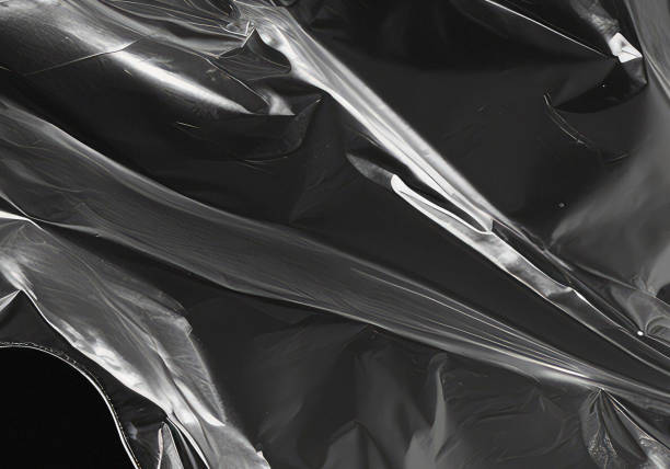 istock Closeup plastic vinyl torn wrap textures. Vector illustration show various crinkled, wrinkled, and transparent plastic wraps with different tear patterns. Black gray design overlays and shadow effect. 2198930268