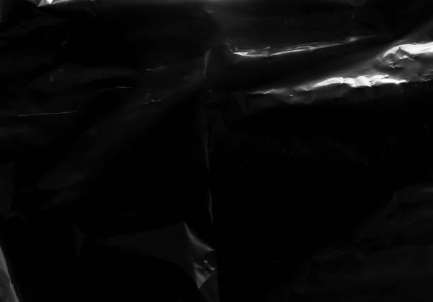 istock Closeup plastic vinyl torn wrap textures. Vector illustration show various crinkled, wrinkled, and transparent plastic wraps with different tear patterns. Black gray design overlays and shadow effect. 2198930271
