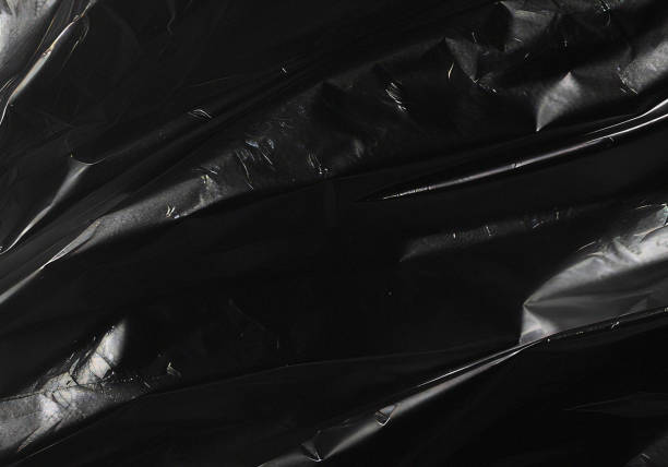 istock Closeup plastic vinyl torn wrap textures. Vector illustration show various crinkled, wrinkled, and transparent plastic wraps with different tear patterns. Black gray design overlays and shadow effect. 2198930300